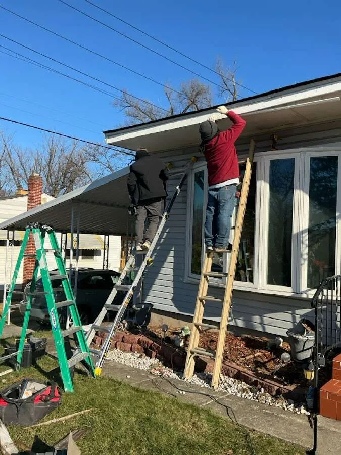 Restoration crew performing exterior repair in Overland Park
